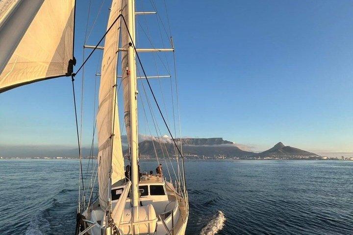 Sailing boat at sunset off the Mossel Bay coast, Sunset Boat Cruise